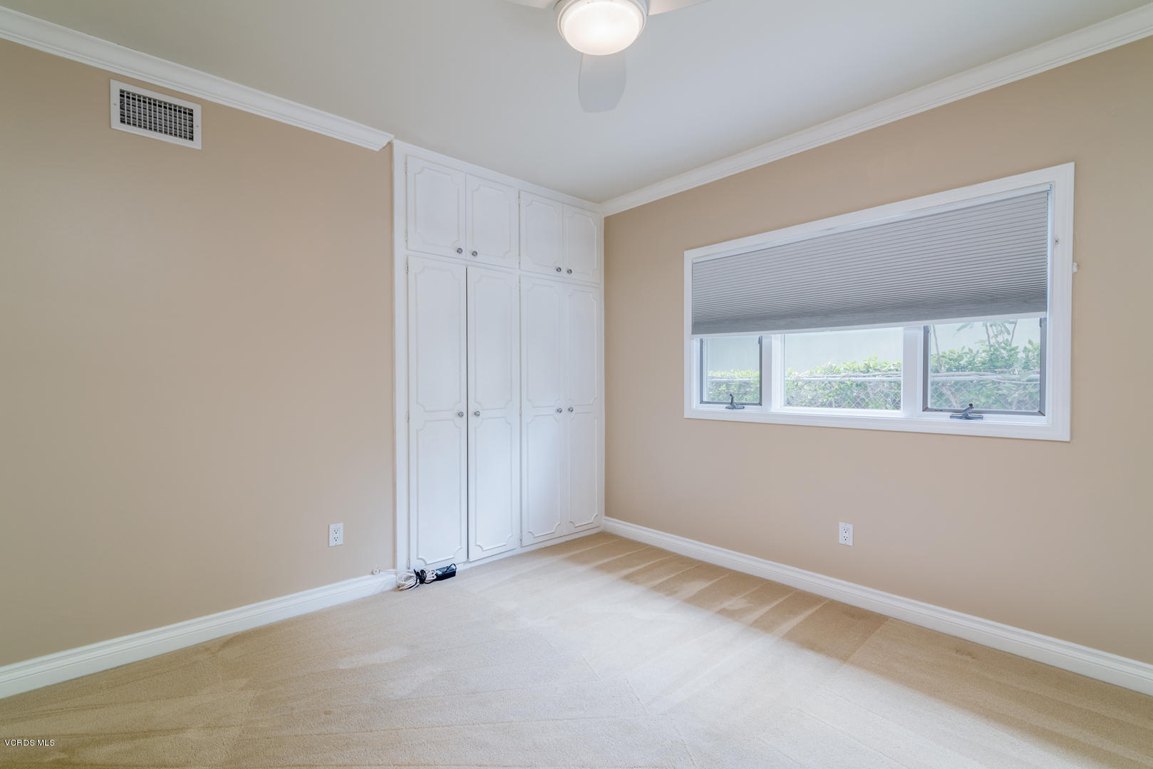 18932 Olympia Street Porter Ranch, CA 91326 - Photo 36 of 39 an empty room with a window