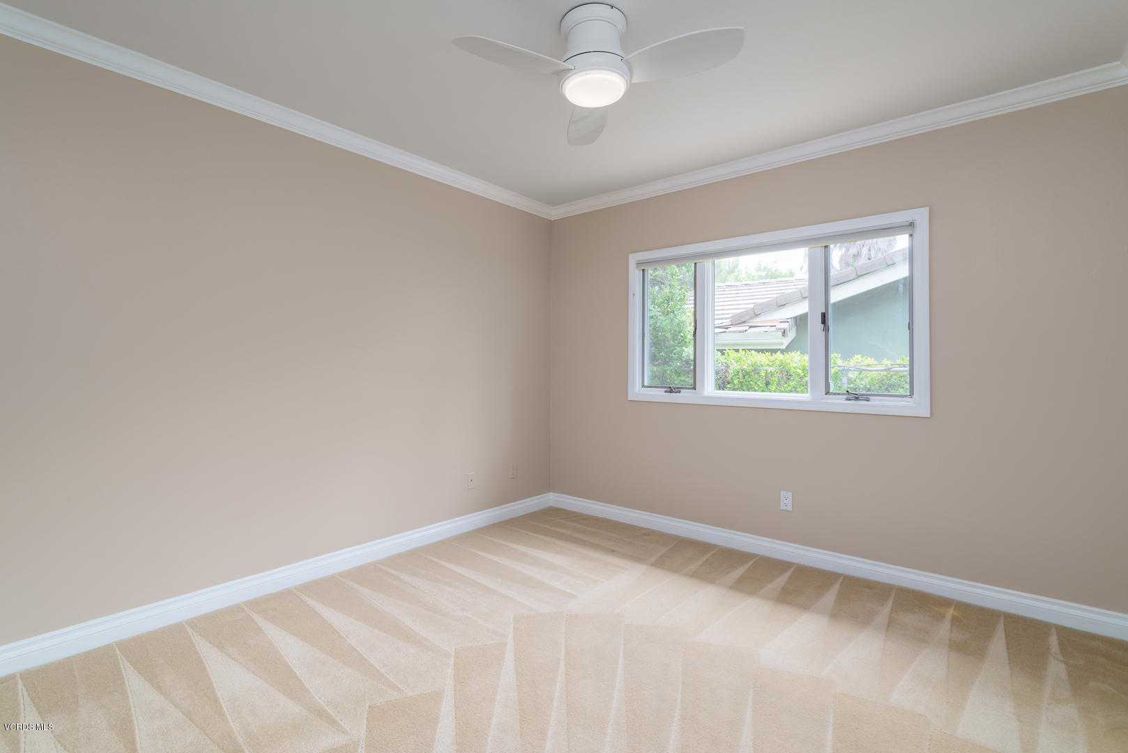 18932 Olympia Street Porter Ranch, CA 91326 - Photo 37 of 39 an empty room with a window