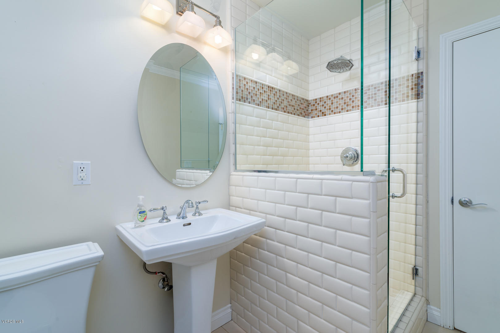 18932 Olympia Street Porter Ranch, CA 91326 - Photo 39 of 39 a bathroom with a sink a toilet and shower