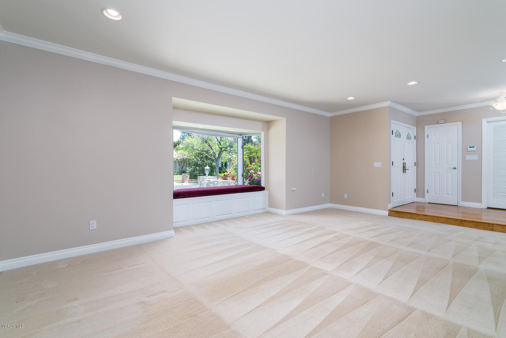 18932 Olympia Street Porter Ranch, CA 91326 - Photo 7 of 39 a view of an empty room with a window