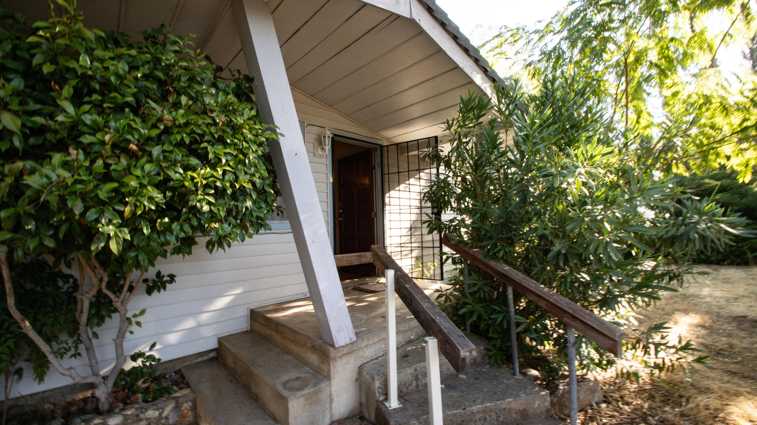 17768 Irish Road Redding, CA 96003 - Photo 2 of 17 a view of a house with a small yard