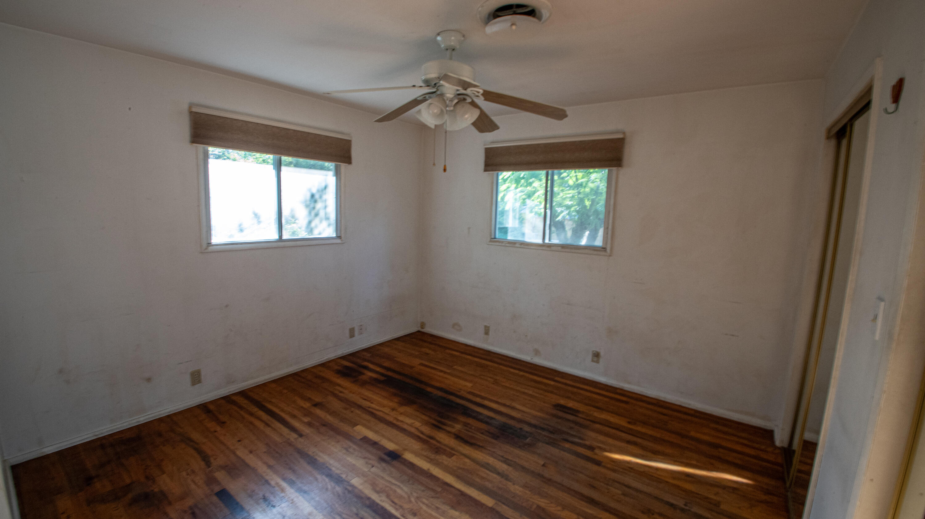 17768 Irish Road Redding, CA 96003 - Photo 8 of 17 a room with a window and a ceiling fan