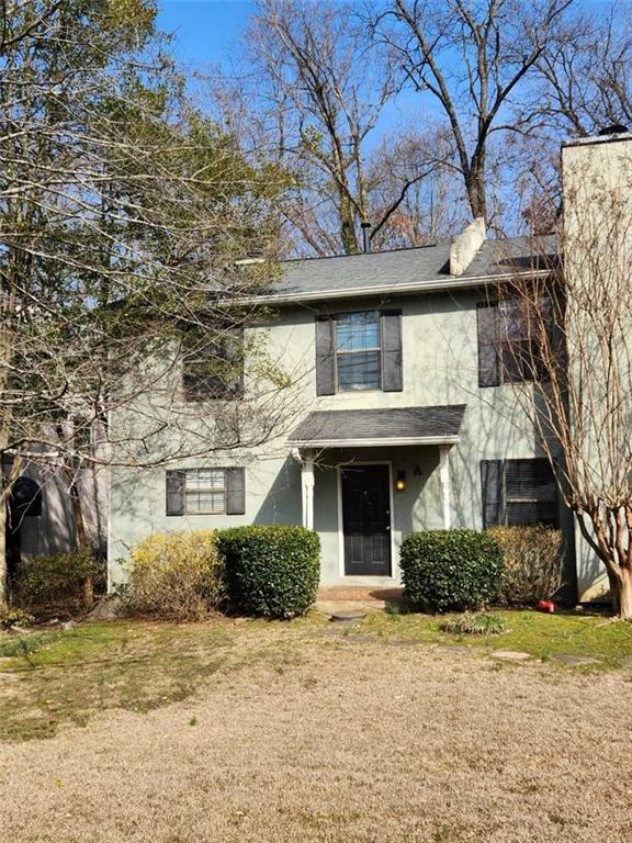 4197 North Shallowford Road, Unit A Chamblee, GA 30341 - Photo 1 of 1 a front view of a house with a yard