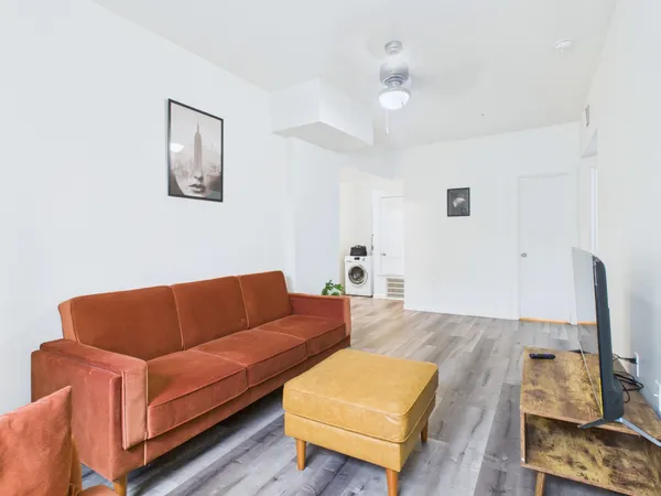 a living room with furniture and a couch