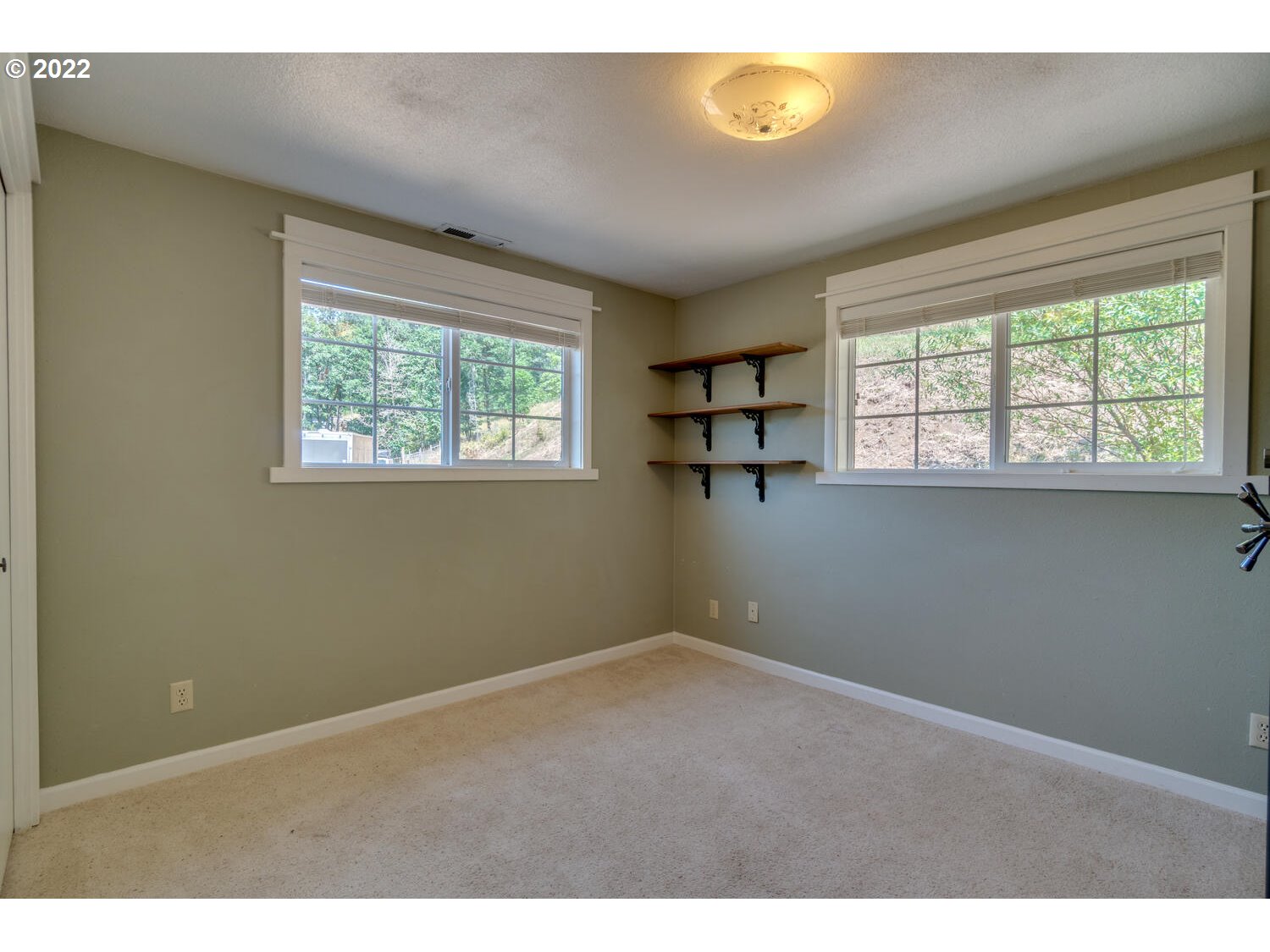 12751 Dupee Valley Road Sheridan, OR 97378 - Photo 12 of 32 a view of empty room with windows