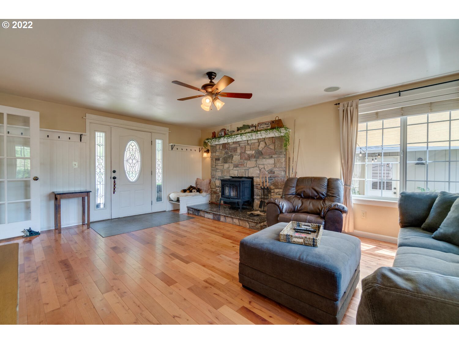 12751 Dupee Valley Road Sheridan, OR 97378 - Photo 2 of 32 a living room with furniture and a fireplace