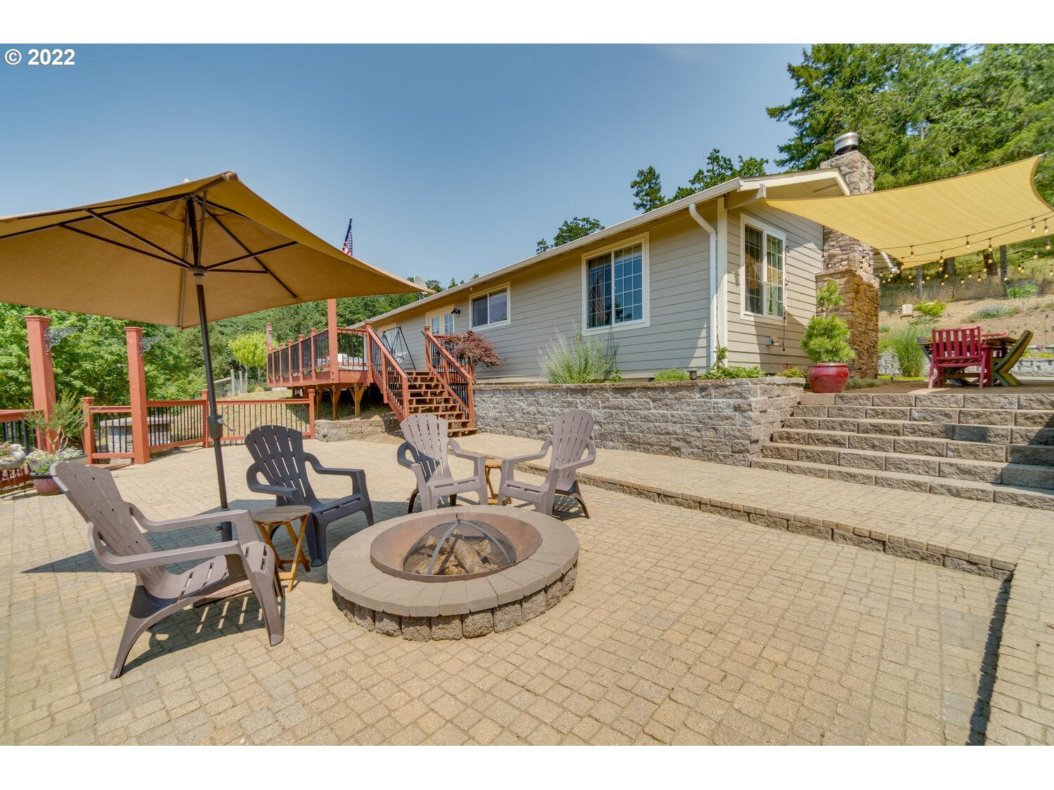 12751 Dupee Valley Road Sheridan, OR 97378 - Photo 21 of 32 a view of a white house with swimming pool and sitting area