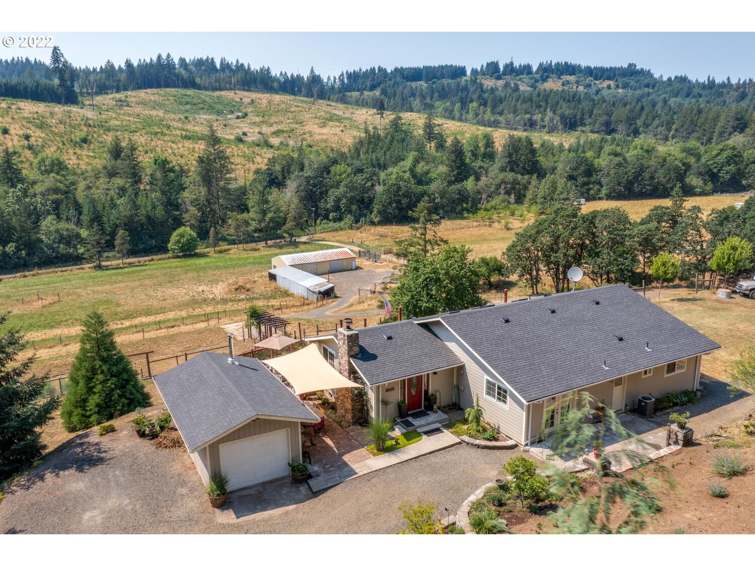 12751 Dupee Valley Road Sheridan, OR 97378 - Photo 24 of 32 a view of a house with pool and a yard