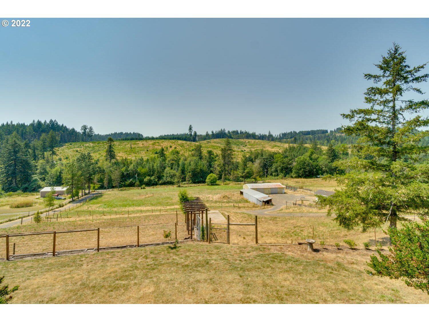 12751 Dupee Valley Road Sheridan, OR 97378 - Photo 27 of 32 a view of a swimming pool with an outdoor seating