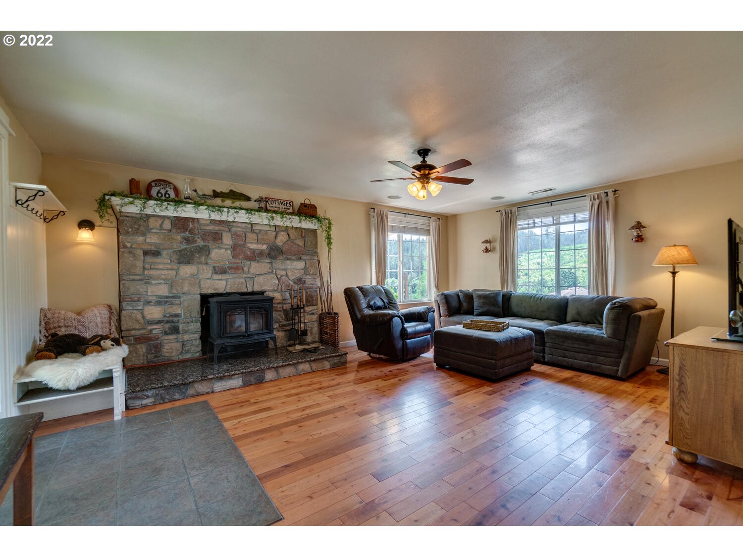 12751 Dupee Valley Road Sheridan, OR 97378 - Photo 3 of 32 a living room with furniture and a fireplace