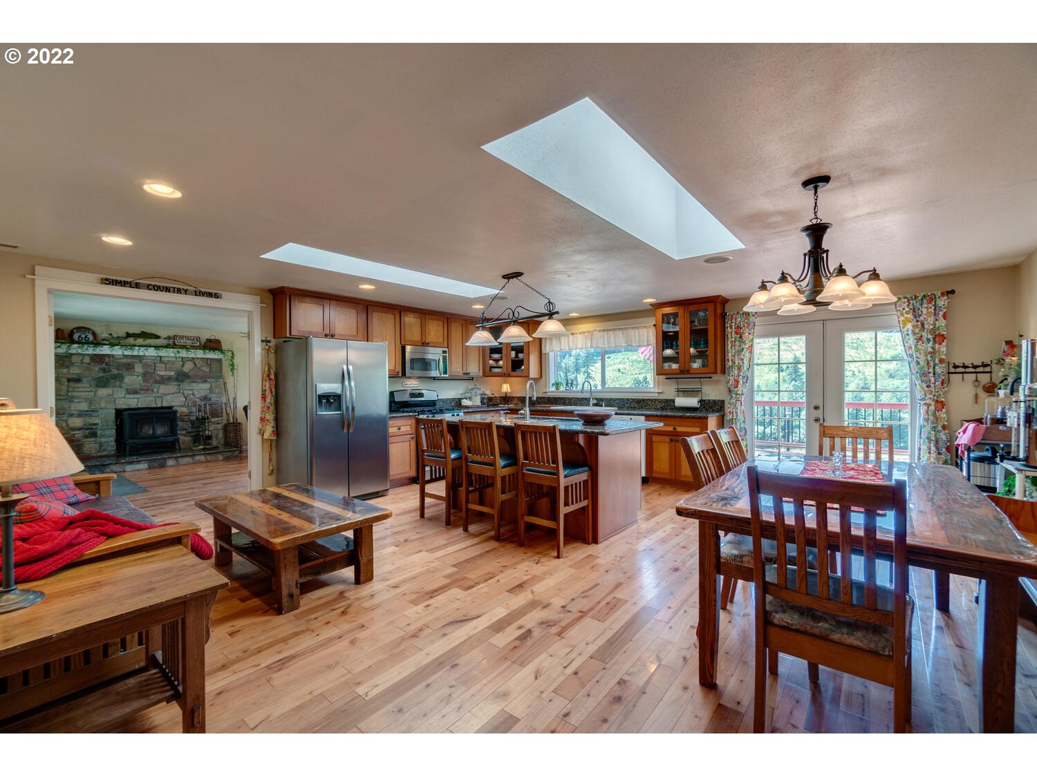 12751 Dupee Valley Road Sheridan, OR 97378 - Photo 5 of 32 a living room with furniture and a floor to ceiling window