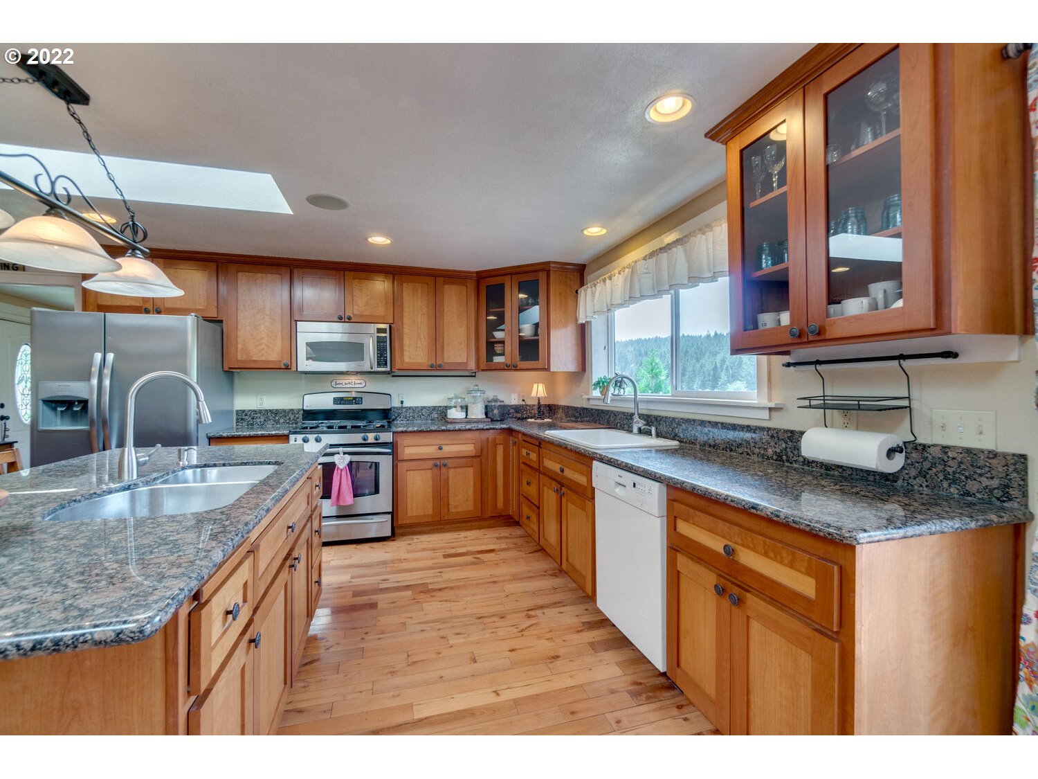 12751 Dupee Valley Road Sheridan, OR 97378 - Photo 6 of 32 a kitchen with stainless steel appliances granite countertop a sink stove and cabinets