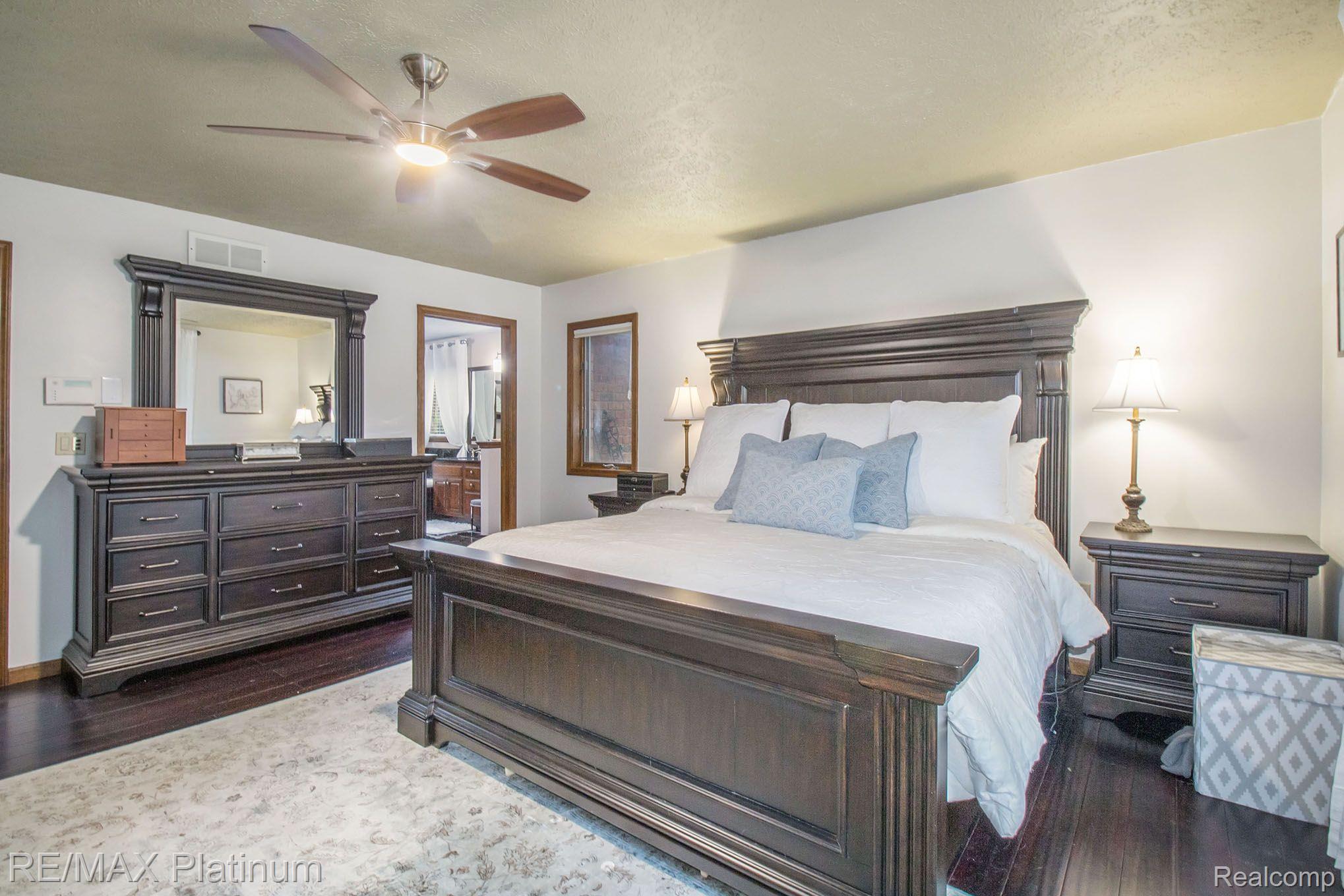 100 North Latson Road Howell, MI 48843 - Photo 14 of 27 Primary Bedroom