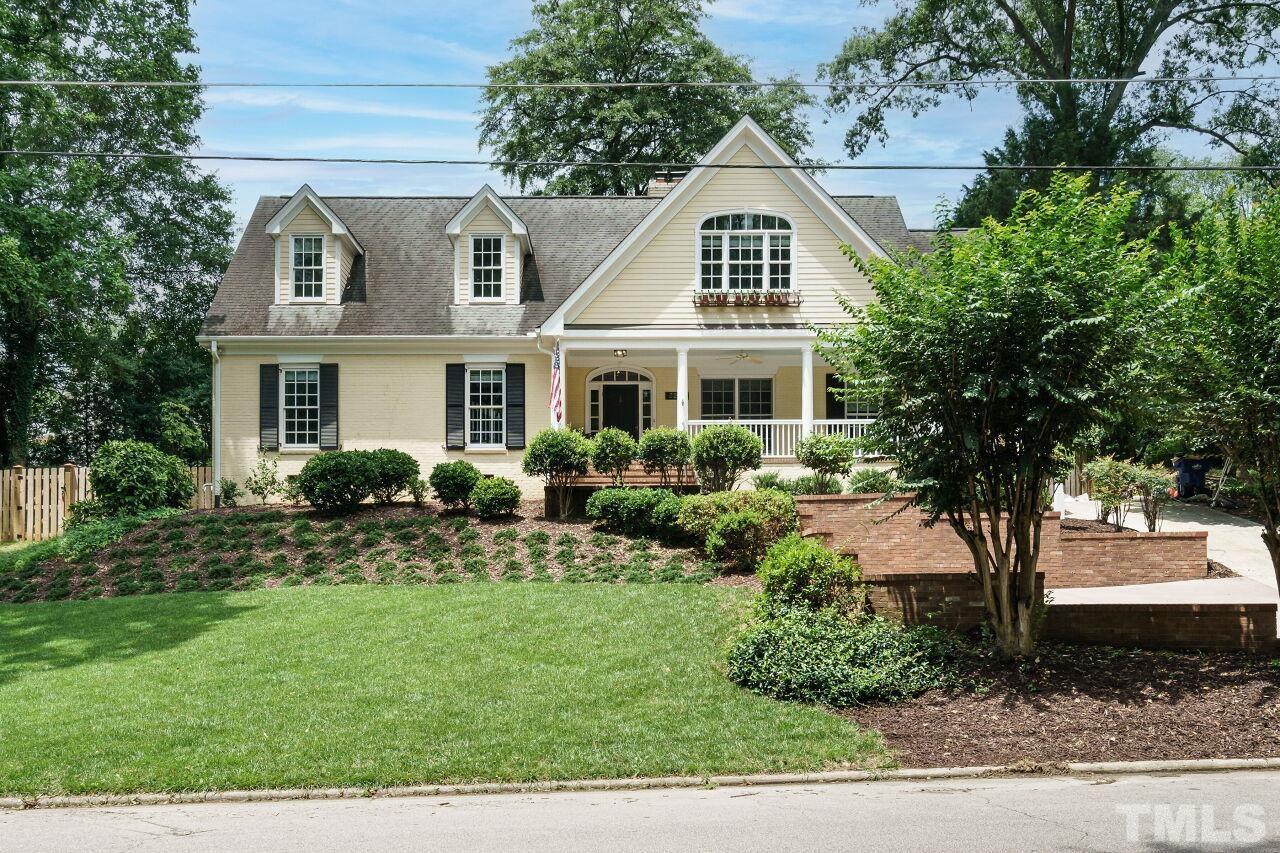 3201 Landor Road Raleigh, NC 27609 - Photo 2 of 41 a front view of a house with a yard