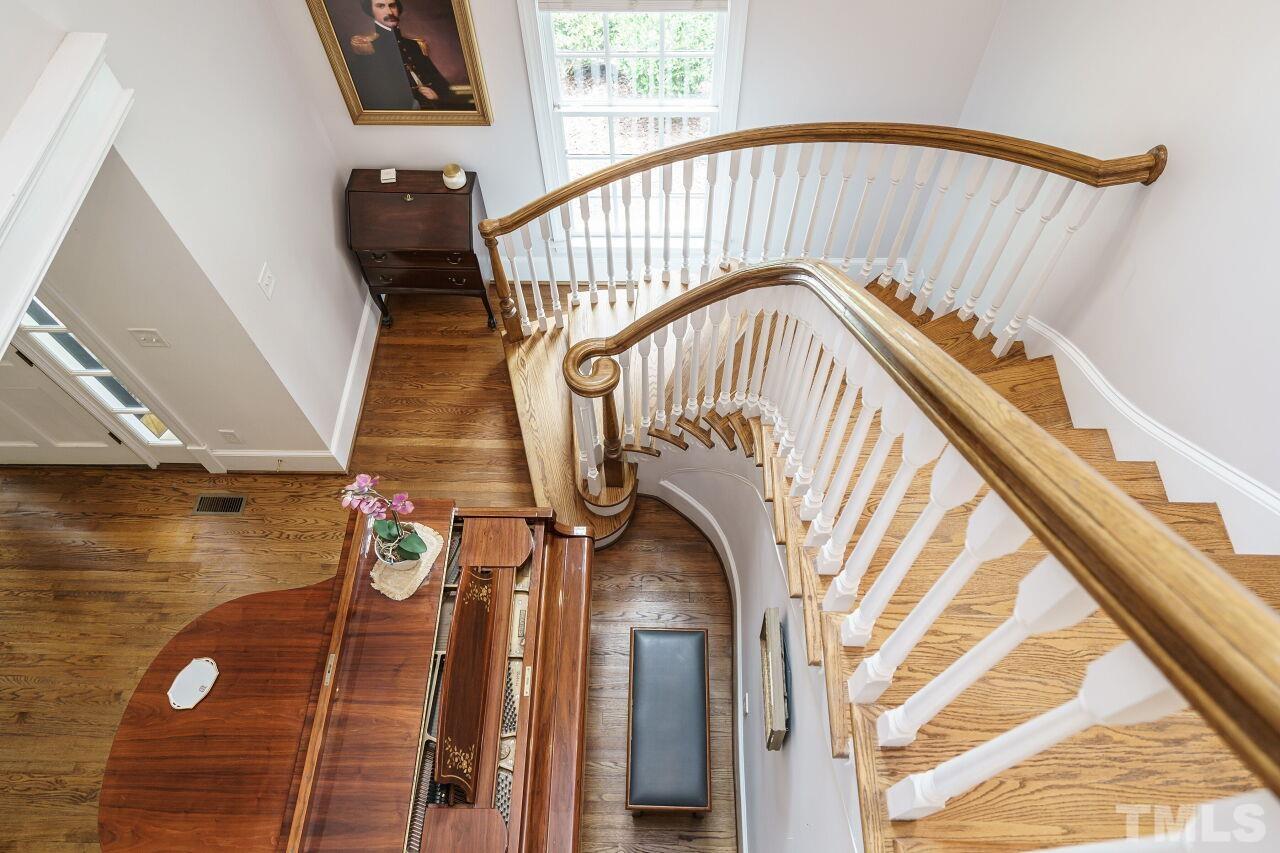 3201 Landor Road Raleigh, NC 27609 - Photo 24 of 41 a view of staircase with white walls