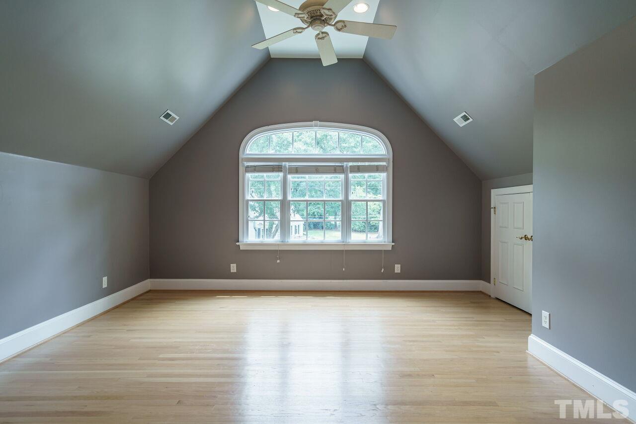 3201 Landor Road Raleigh, NC 27609 - Photo 26 of 41 wooden floor in an empty room with a window