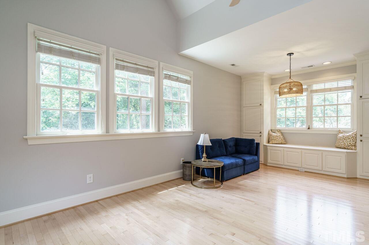 3201 Landor Road Raleigh, NC 27609 - Photo 34 of 41 a living room with furniture and a large window