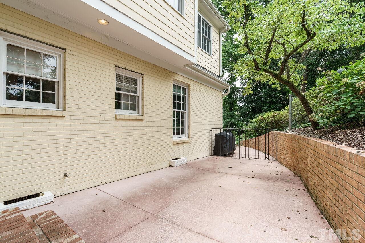 3201 Landor Road Raleigh, NC 27609 - Photo 38 of 41 a view of a house with backyard