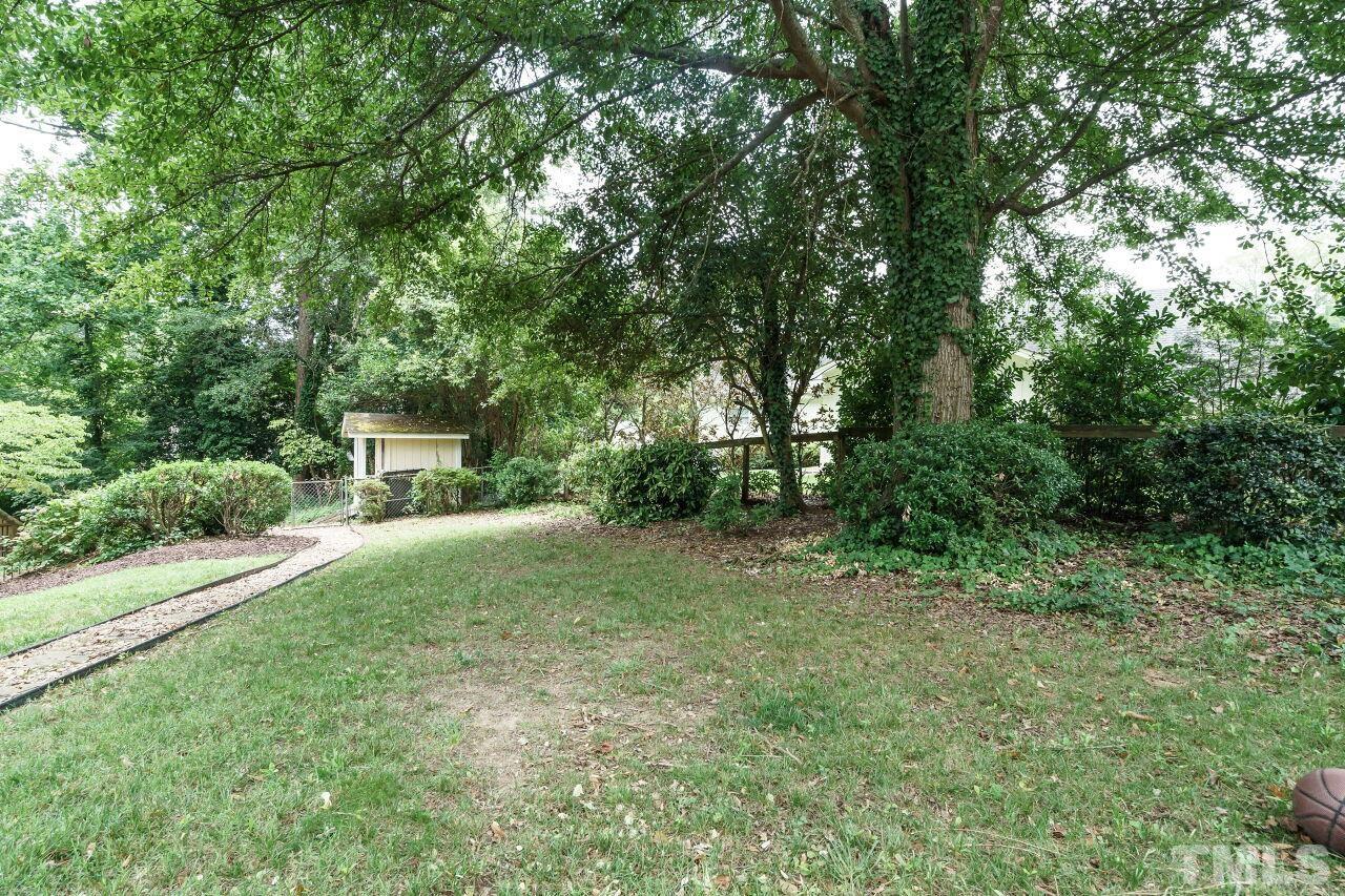 3201 Landor Road Raleigh, NC 27609 - Photo 39 of 41 a view of a backyard with seating area