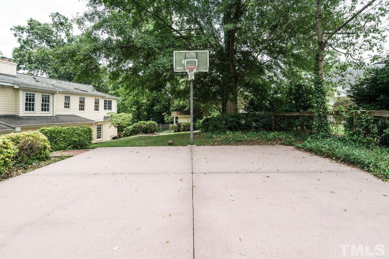 3201 Landor Road Raleigh, NC 27609 - Photo 40 of 41 a view of a house with a yard