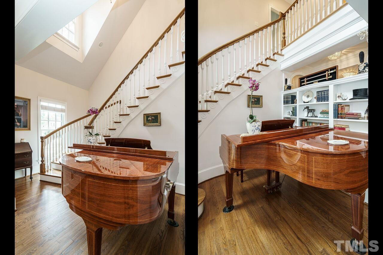 3201 Landor Road Raleigh, NC 27609 - Photo 4 of 41 a room with wooden floor pool table and chairs
