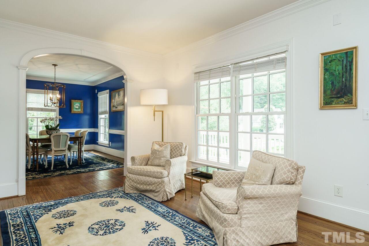 3201 Landor Road Raleigh, NC 27609 - Photo 7 of 41 a living room with furniture and a large window