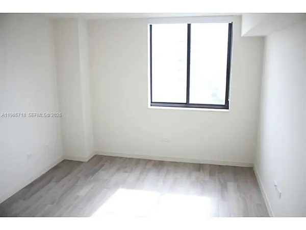 an empty room with a window