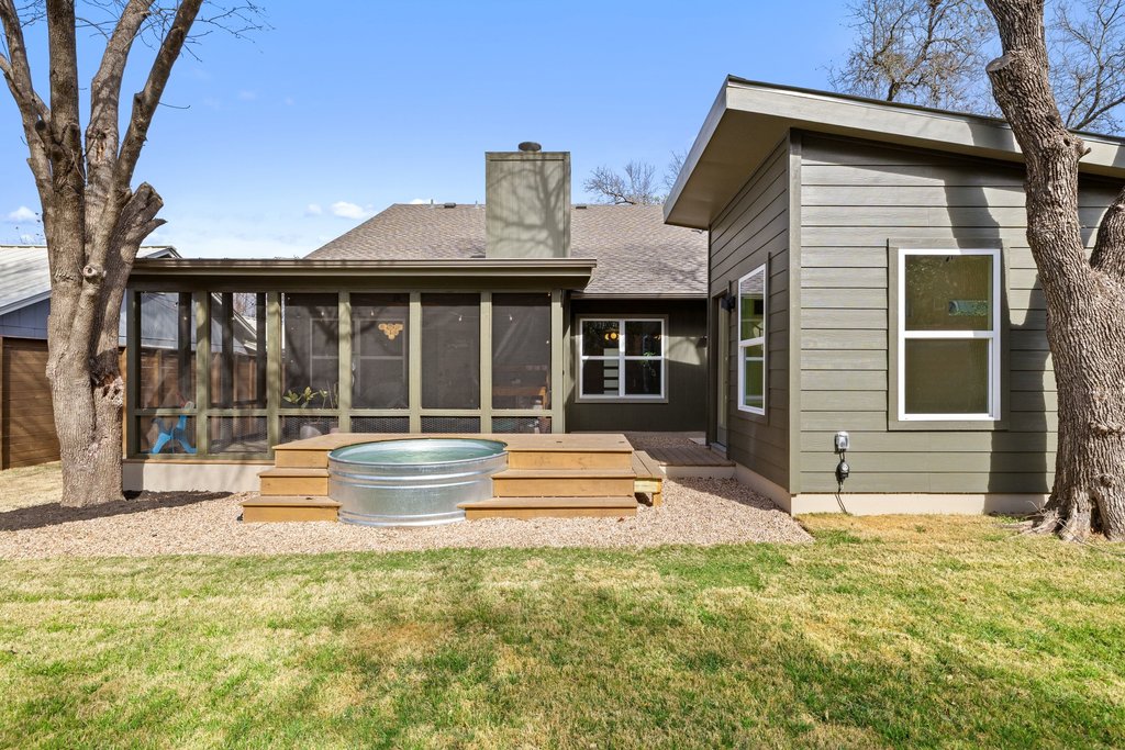 8202 Cache Drive Austin, TX 78749 - Photo 28 of 39 a front view of a house with a yard