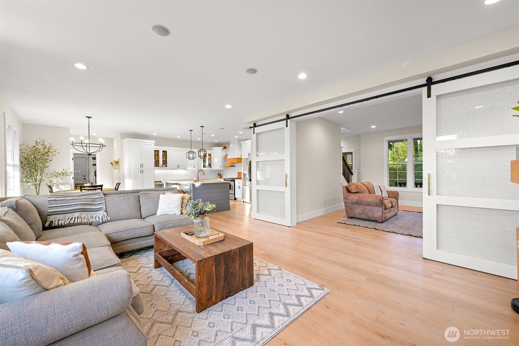 109 West 2nd Street Nooksack, WA 98276 - Photo 12 of 36 a living room with furniture and a view of kitchen