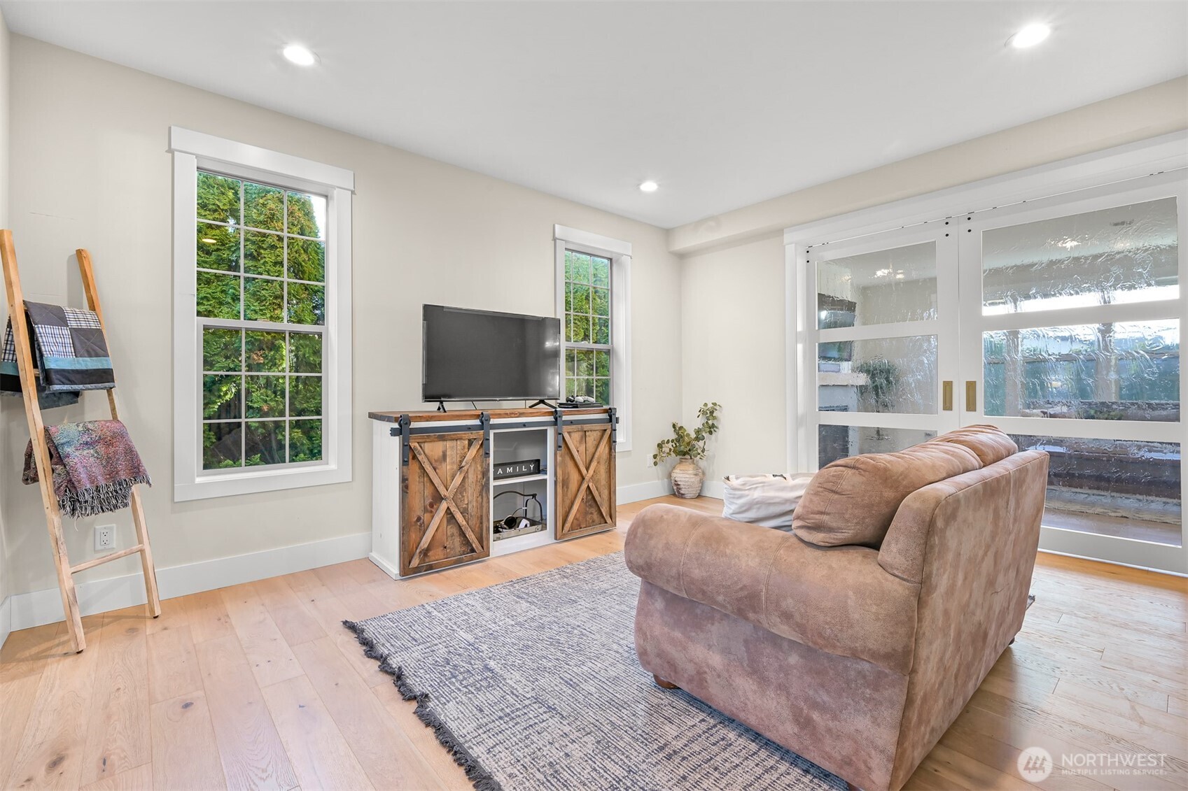 109 West 2nd Street Nooksack, WA 98276 - Photo 14 of 36 a living room with furniture and a flat screen tv