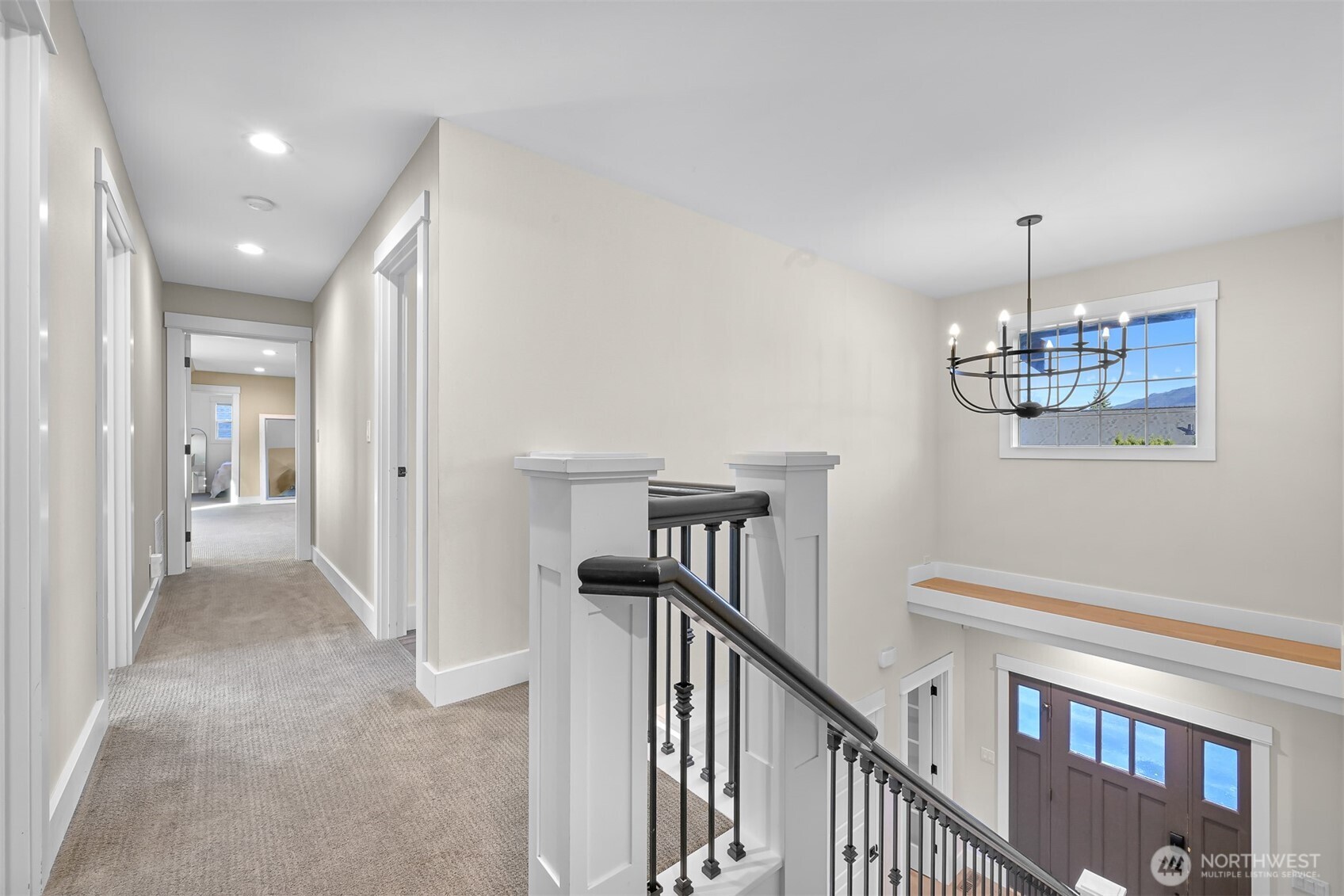 109 West 2nd Street Nooksack, WA 98276 - Photo 18 of 36 a view of a hallway with a chandelier