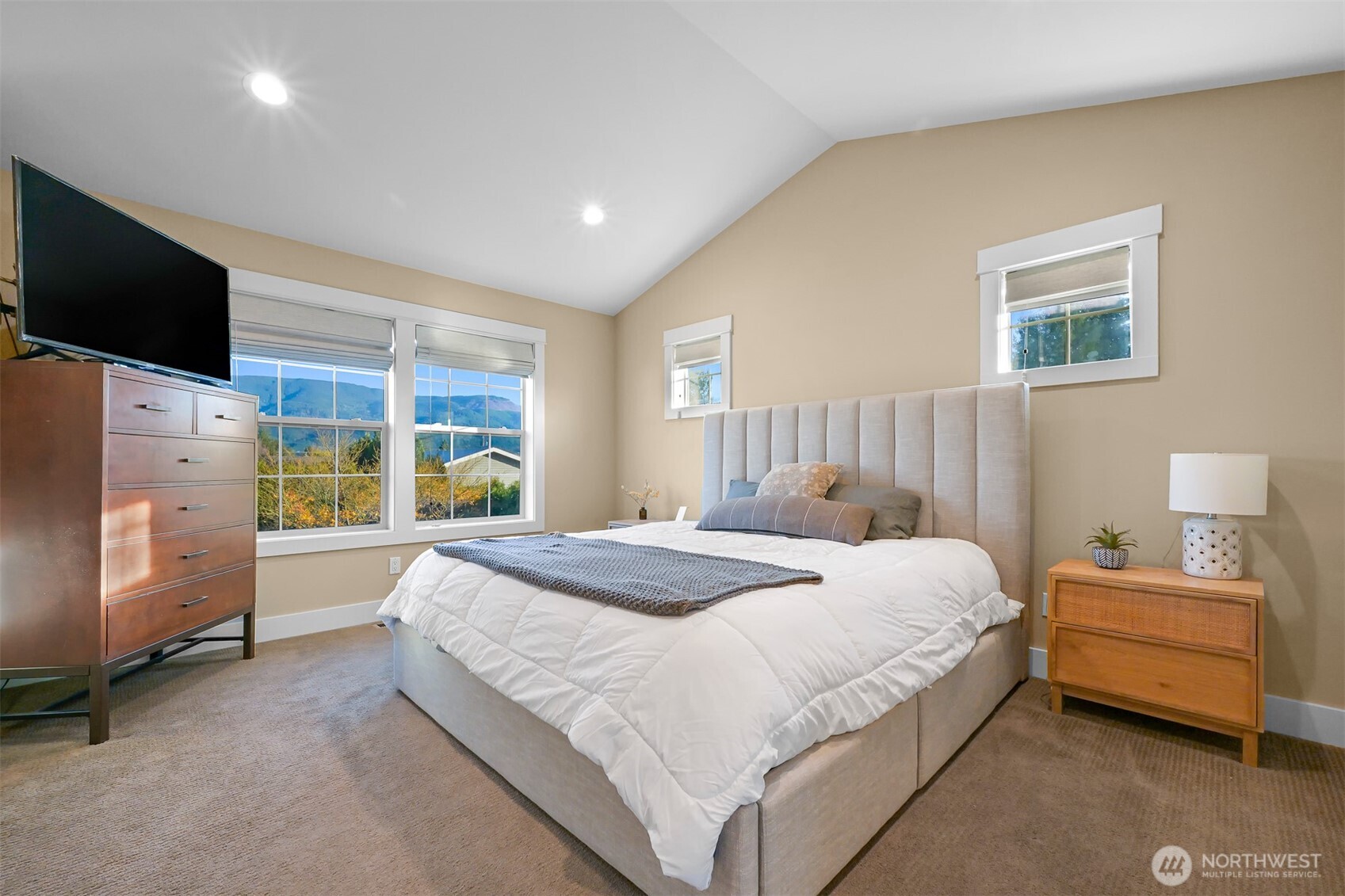 109 West 2nd Street Nooksack, WA 98276 - Photo 19 of 36 a bedroom with a bed flat screen tv and a large window