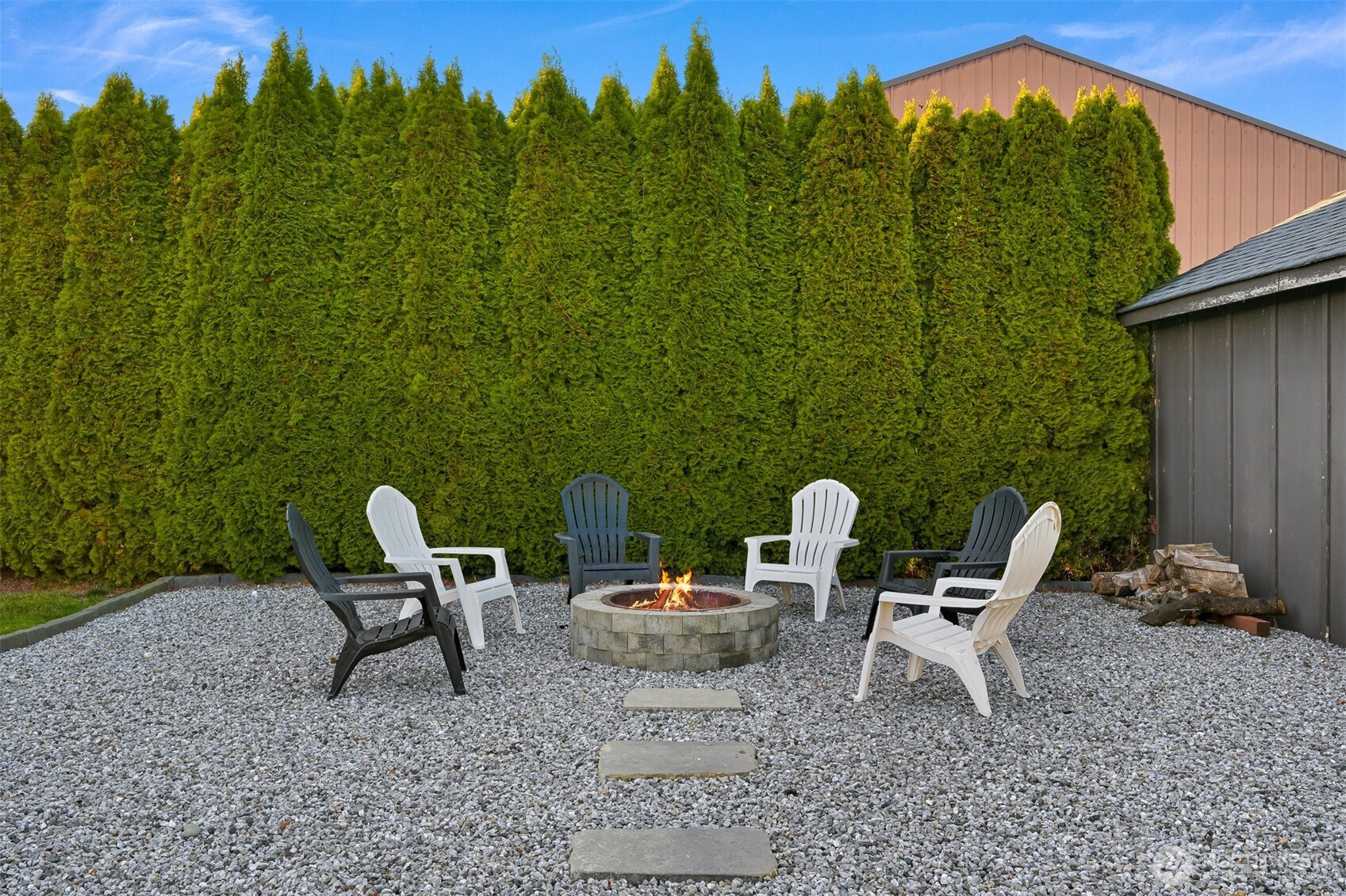 109 West 2nd Street Nooksack, WA 98276 - Photo 35 of 36 a backyard of a house with table and chairs
