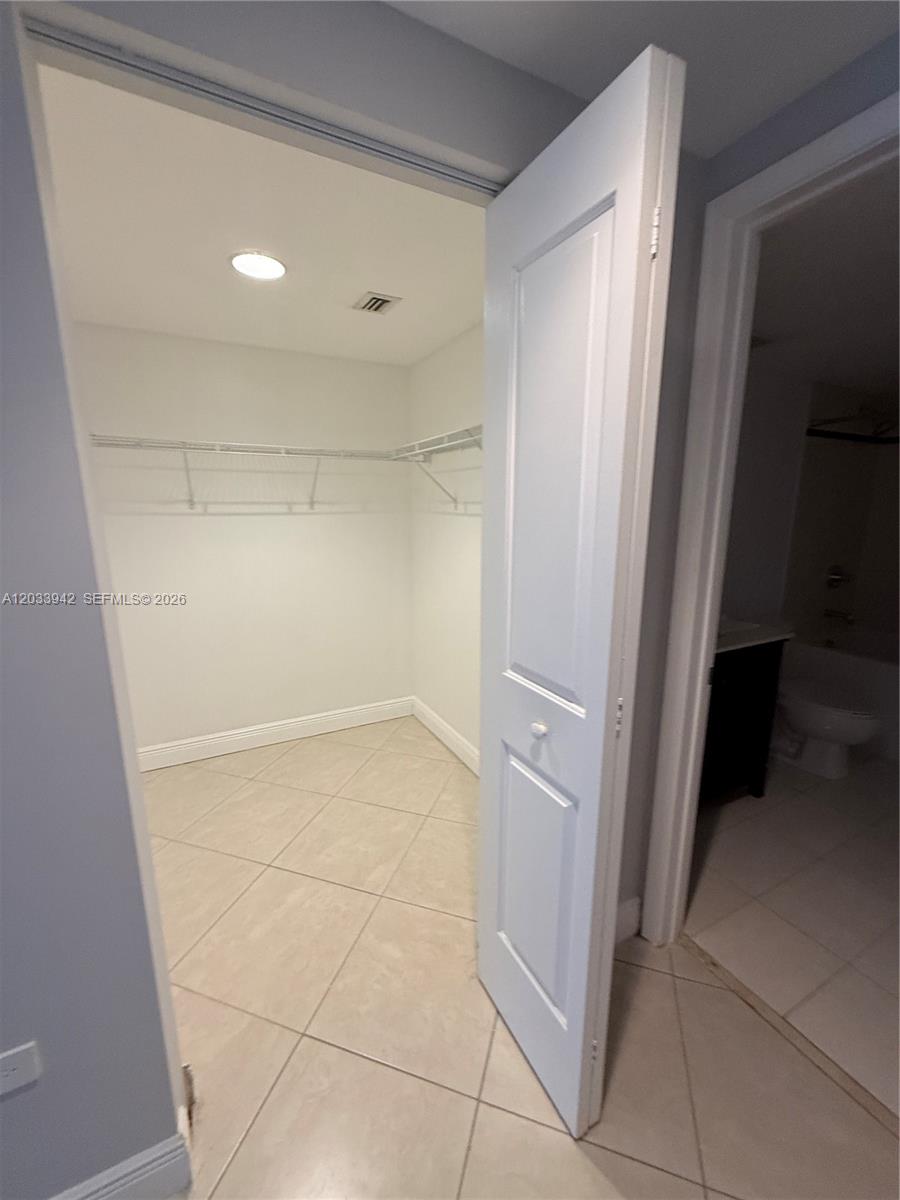 480 Northeast 30th Street, Unit 1504 Miami, FL 33137 - Photo 11 of 14 Walking closet in bedroom