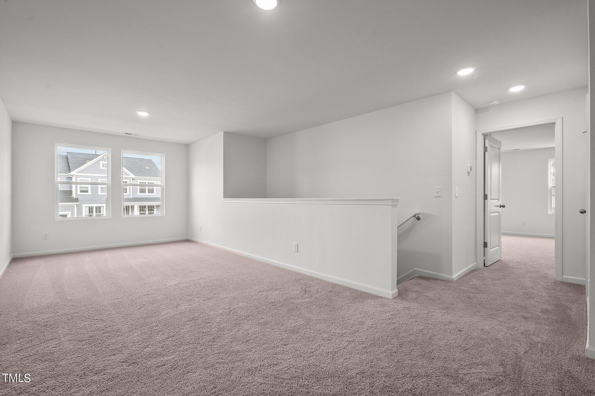 326 Spaight Acrs Way Wake Forest, NC 27587 - Photo 14 of 39 a view of an empty room and a window