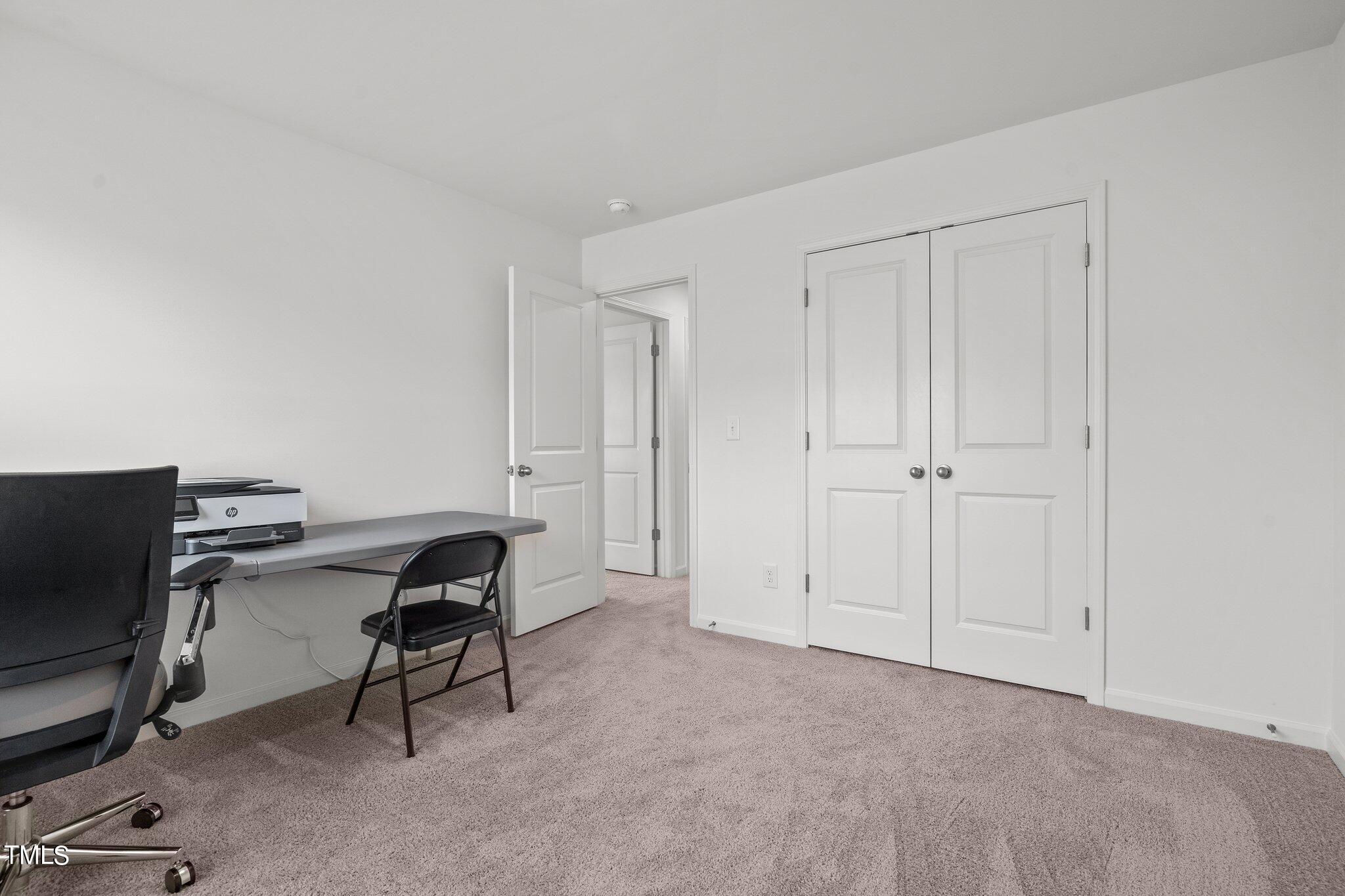 326 Spaight Acrs Way Wake Forest, NC 27587 - Photo 20 of 39 a view of a workspace with furniture