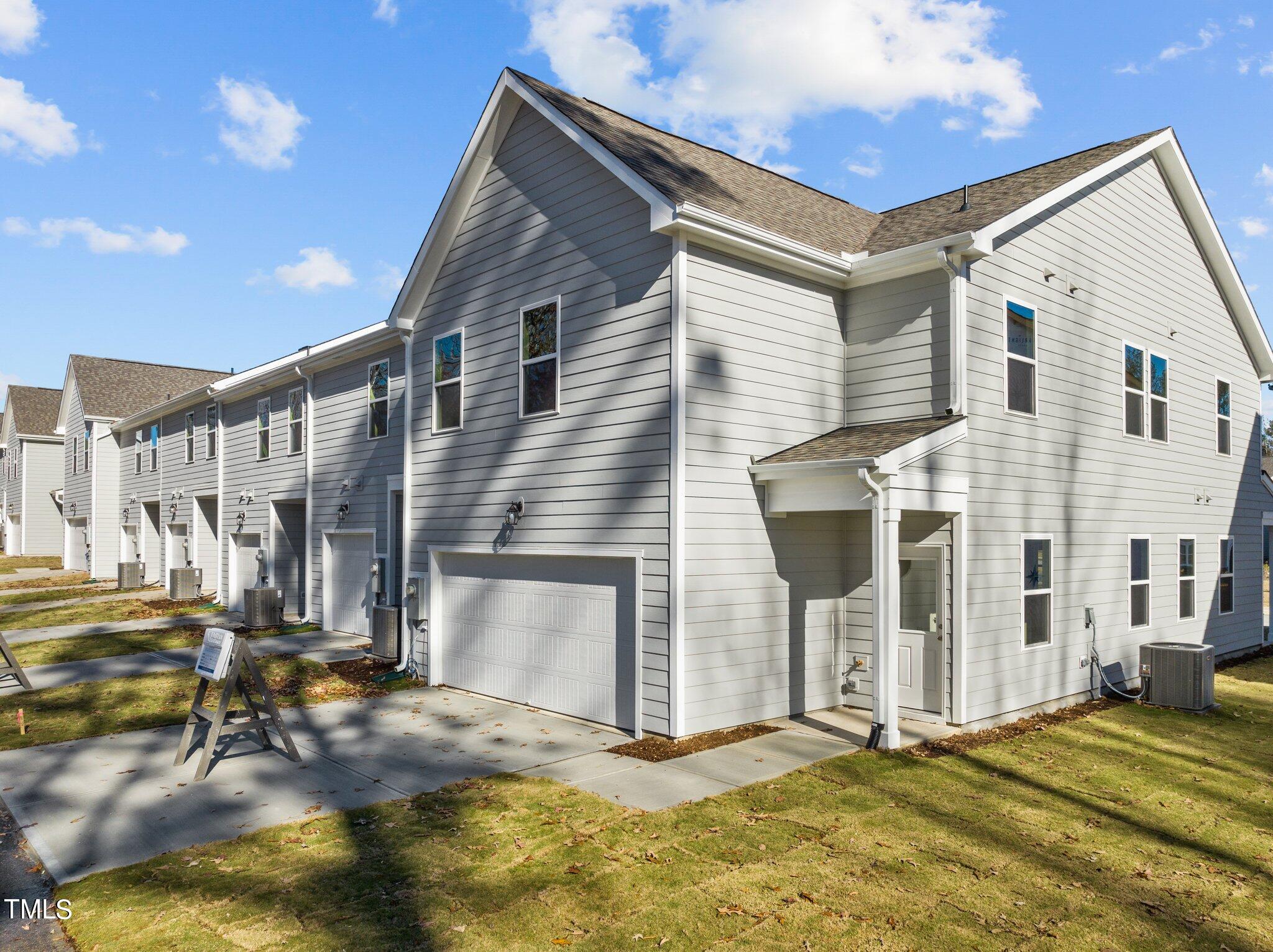 326 Spaight Acrs Way Wake Forest, NC 27587 - Photo 24 of 39 a view of a house with a patio