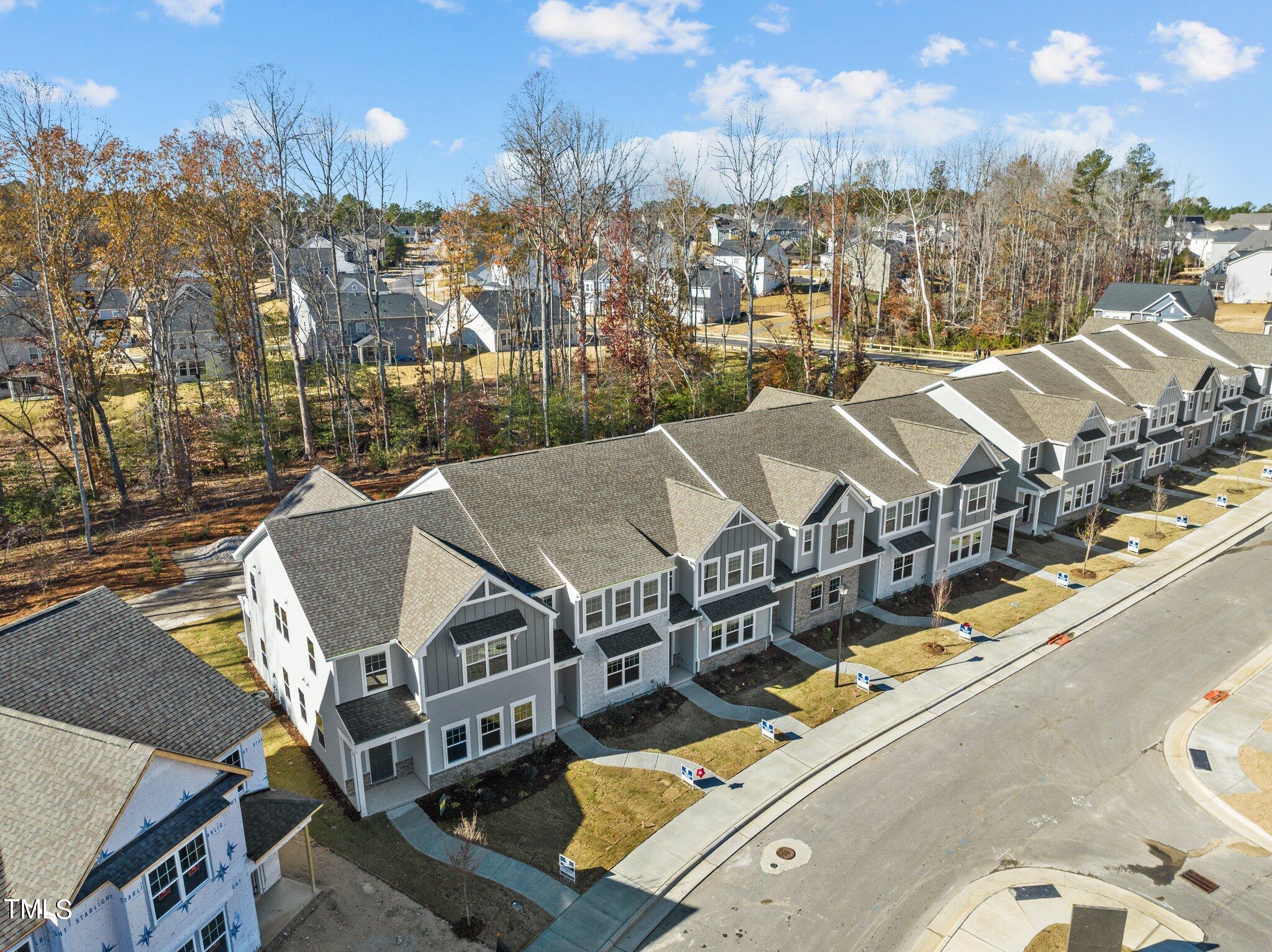 326 Spaight Acrs Way Wake Forest, NC 27587 - Photo 26 of 39 a view of a city from a terrace