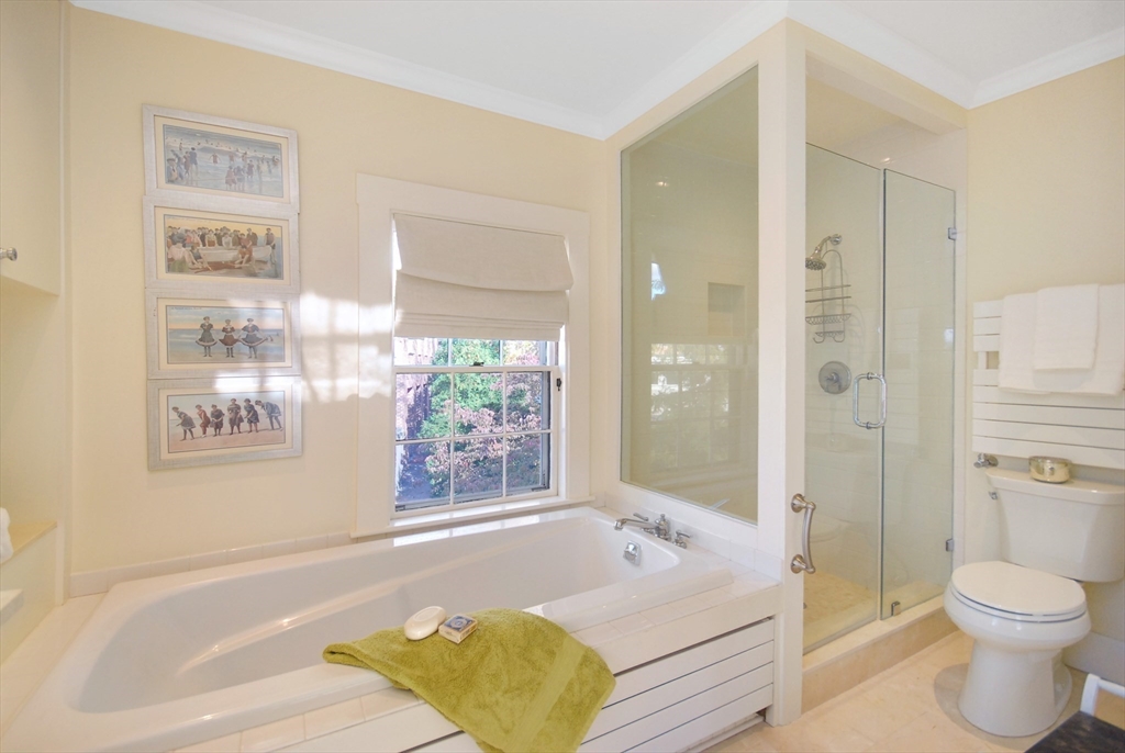 46 Sudbury Road Concord, MA 01742 - Photo 25 of 41 a spacious bathroom with a tub shower and toilet