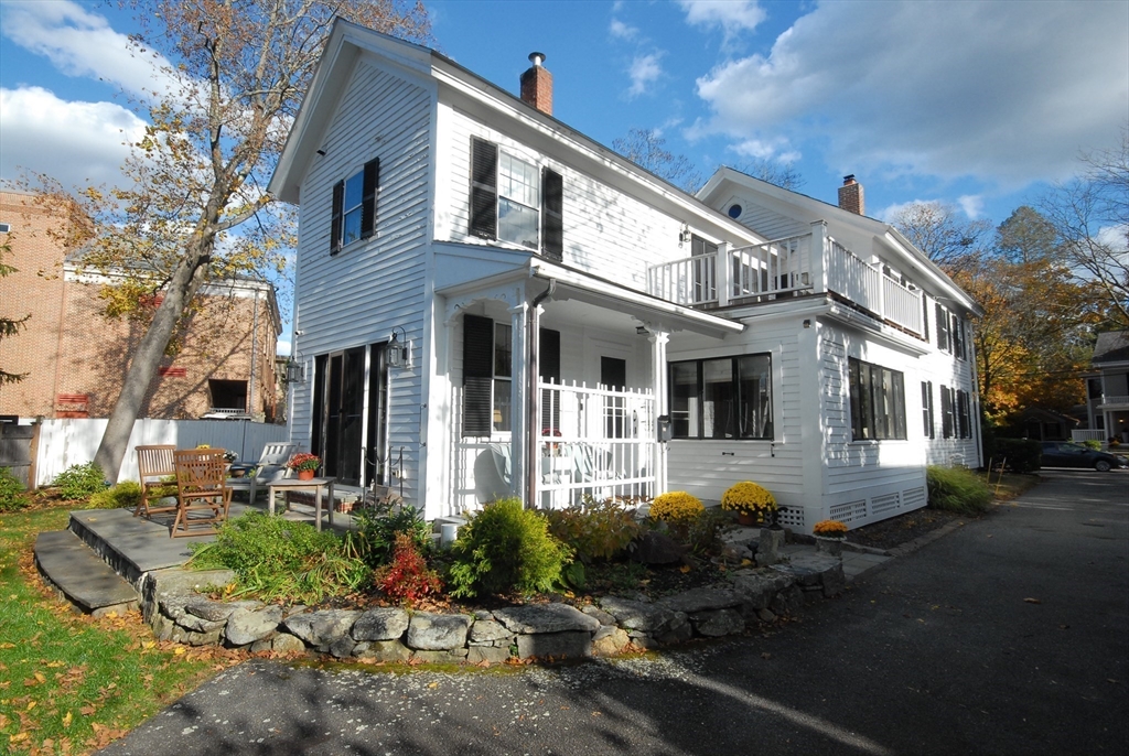 46 Sudbury Road Concord, MA 01742 - Photo 35 of 41 a front view of a house with a yard