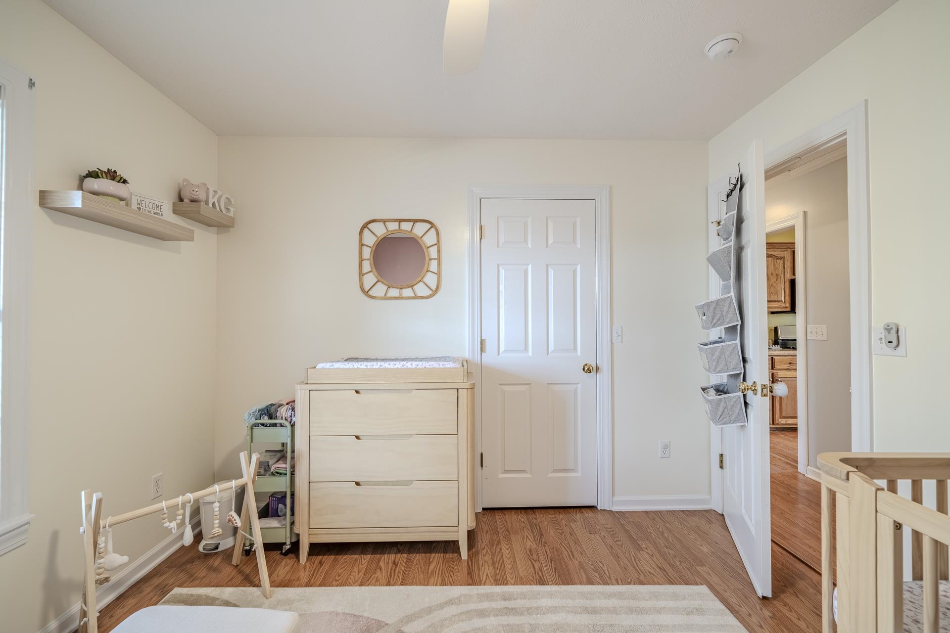 270 2 Boys Road Savannah, TN 38372 - Photo 22 of 35 Bedroom featuring light wood-type flooring and ceiling fan