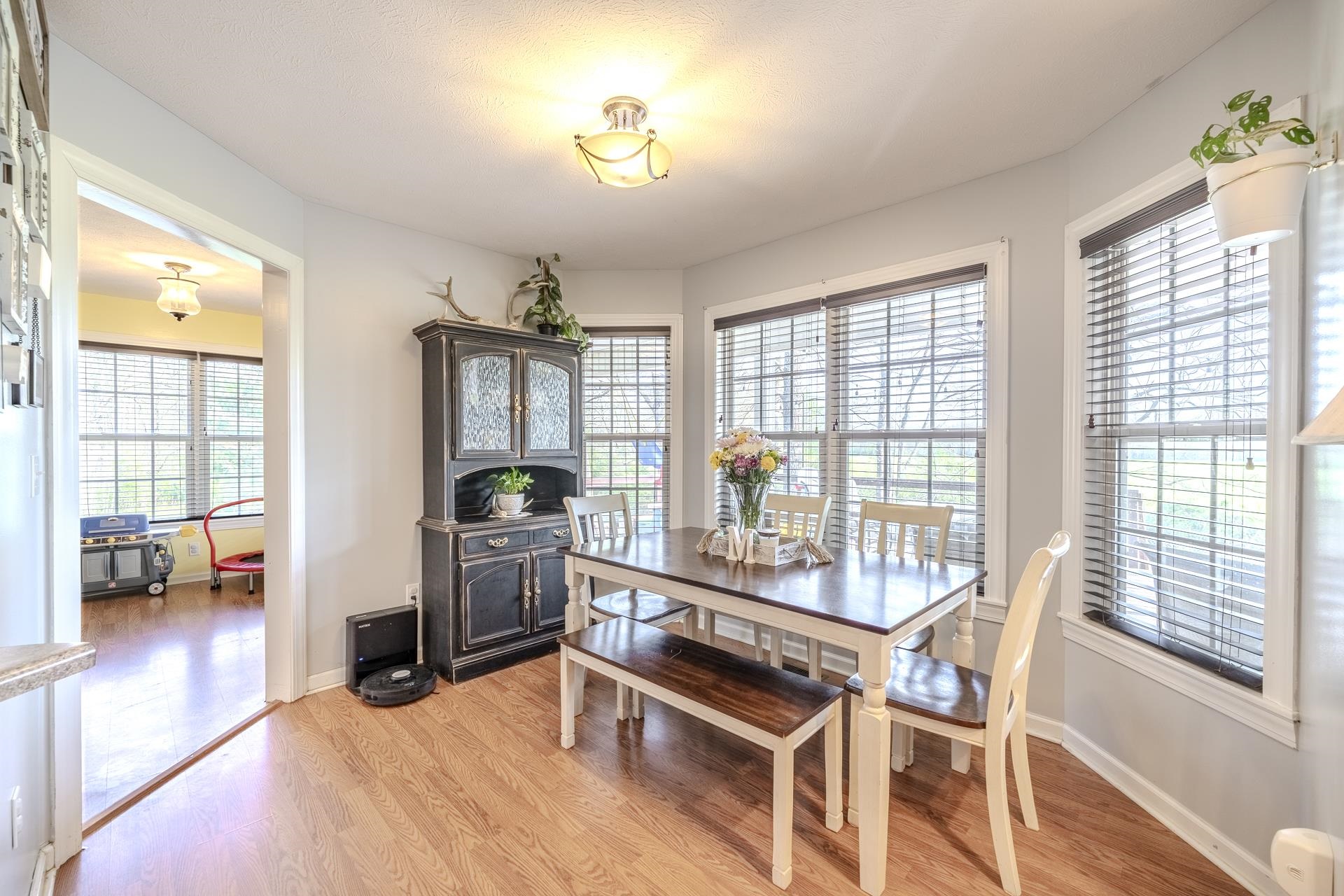 270 2 Boys Road Savannah, TN 38372 - Photo 10 of 35 Dining room with light wood-style flooring and baseboards