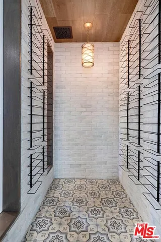 a bathroom with a sink a mirror and vanity
