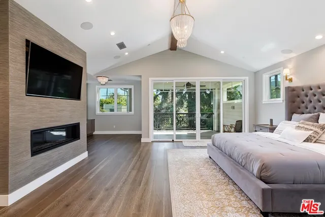 a bathroom with a bathtub and a window