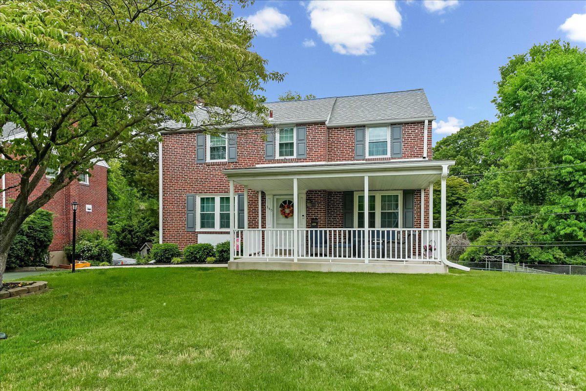 345 Holt Lane Springfield, PA 19064 - Photo 1 of 38 Charming brick home covered front porch