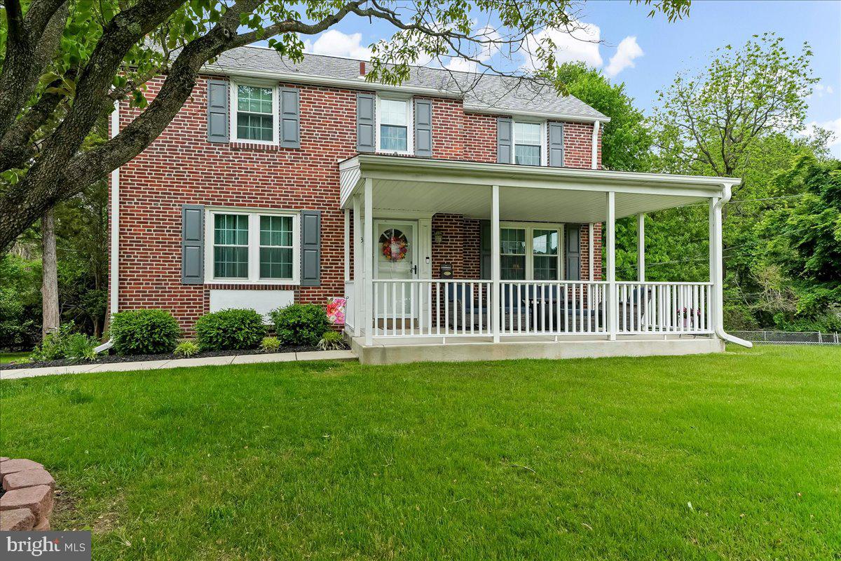 345 Holt Lane Springfield, PA 19064 - Photo 33 of 38 Charming brick home with inviting porch.