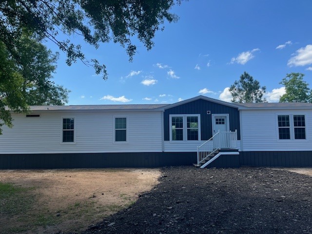 44060 Bryce Lane Callahan, FL 32011 - Photo 2 of 12 front view of a house with a yard