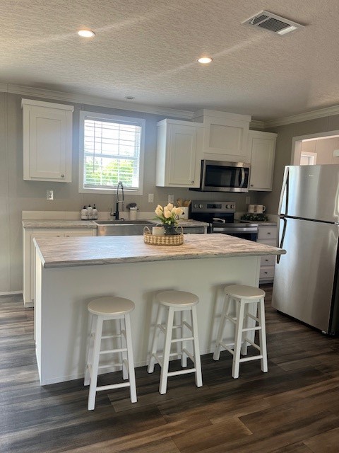 44060 Bryce Lane Callahan, FL 32011 - Photo 4 of 12 a kitchen with a sink cabinets and wooden floor