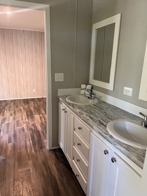 44060 Bryce Lane Callahan, FL 32011 - Photo 10 of 12 a bathroom with a granite countertop sink and a mirror