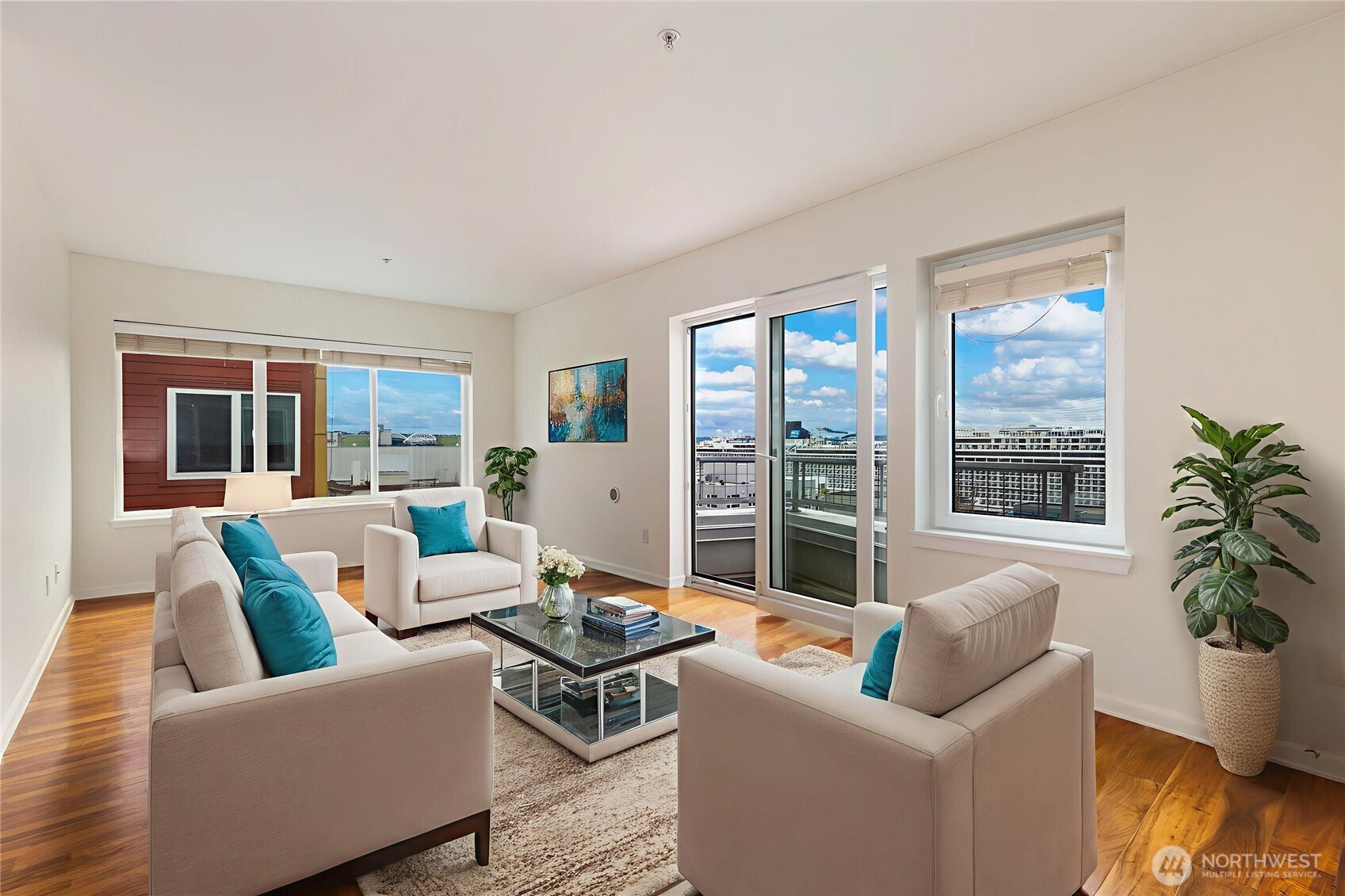 2440 Western Avenue, Unit 807 Seattle, WA 98121 - Photo 14 of 32 a living room with furniture and a large window